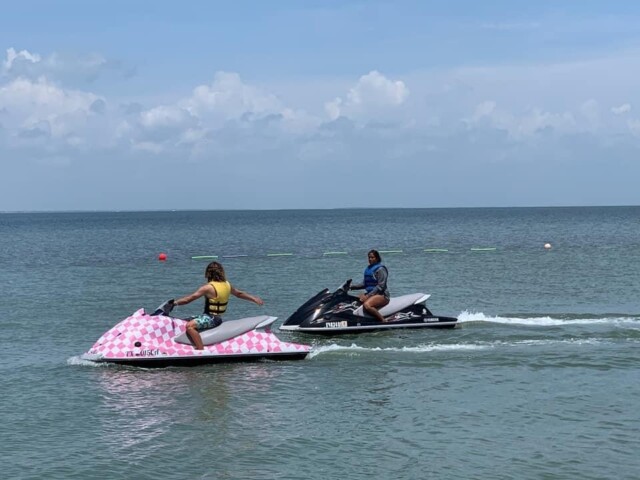 Two people on jet ski rentals SPI